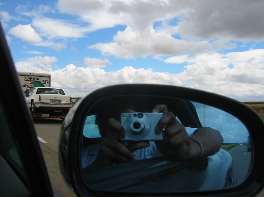 Arshad, mirror, sky.